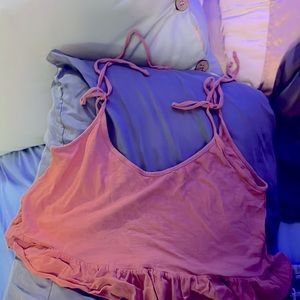 Pink size extra small made in Mexico is 95% cotton, 5% polyester